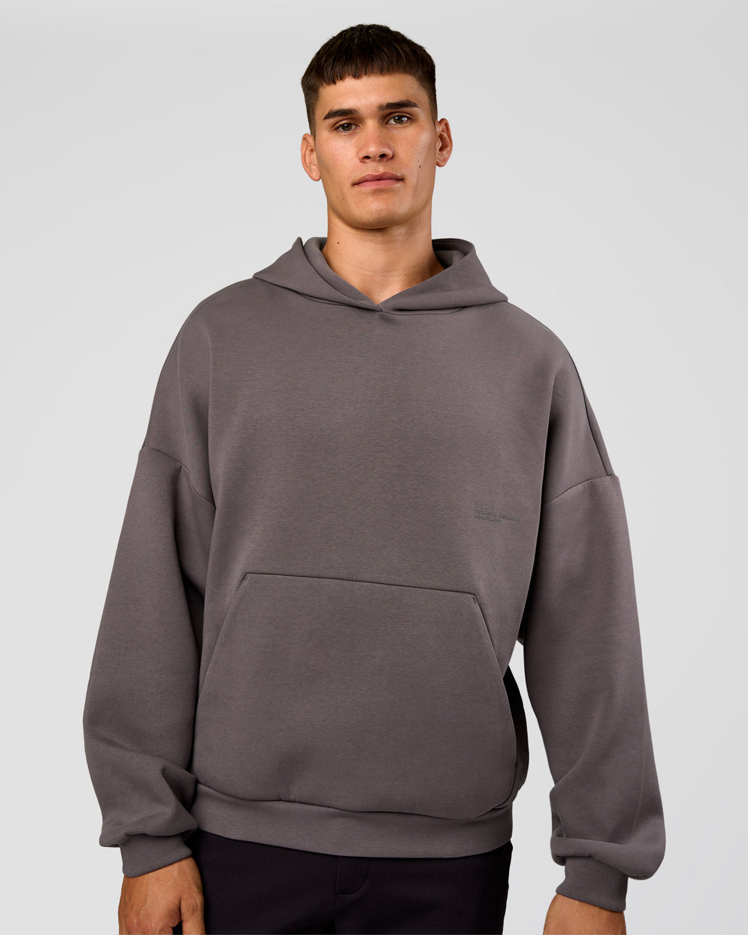 Man wearing AfterDark ZeroCrease Oversized Hoodie - Duskstone | Model:Jackson | Size:L - view 10