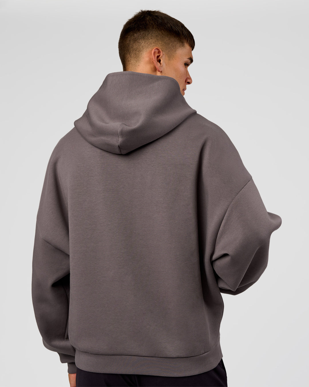 Man wearing AfterDark ZeroCrease Oversized Hoodie - Duskstone | Model:Jackson | Size:L - view 6