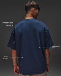 Man wearing AfterDark ZeroCrease Oversized Tee - Future Navy | Model:Jackson | Size:L | Thumbnail Index: 1