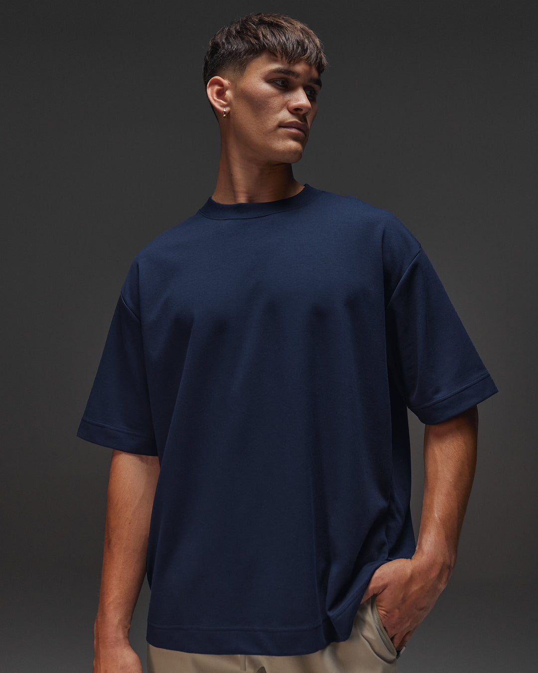 Man wearing AfterDark ZeroCrease Oversized Tee - Future Navy | Model:Jackson | Size:L - view 1