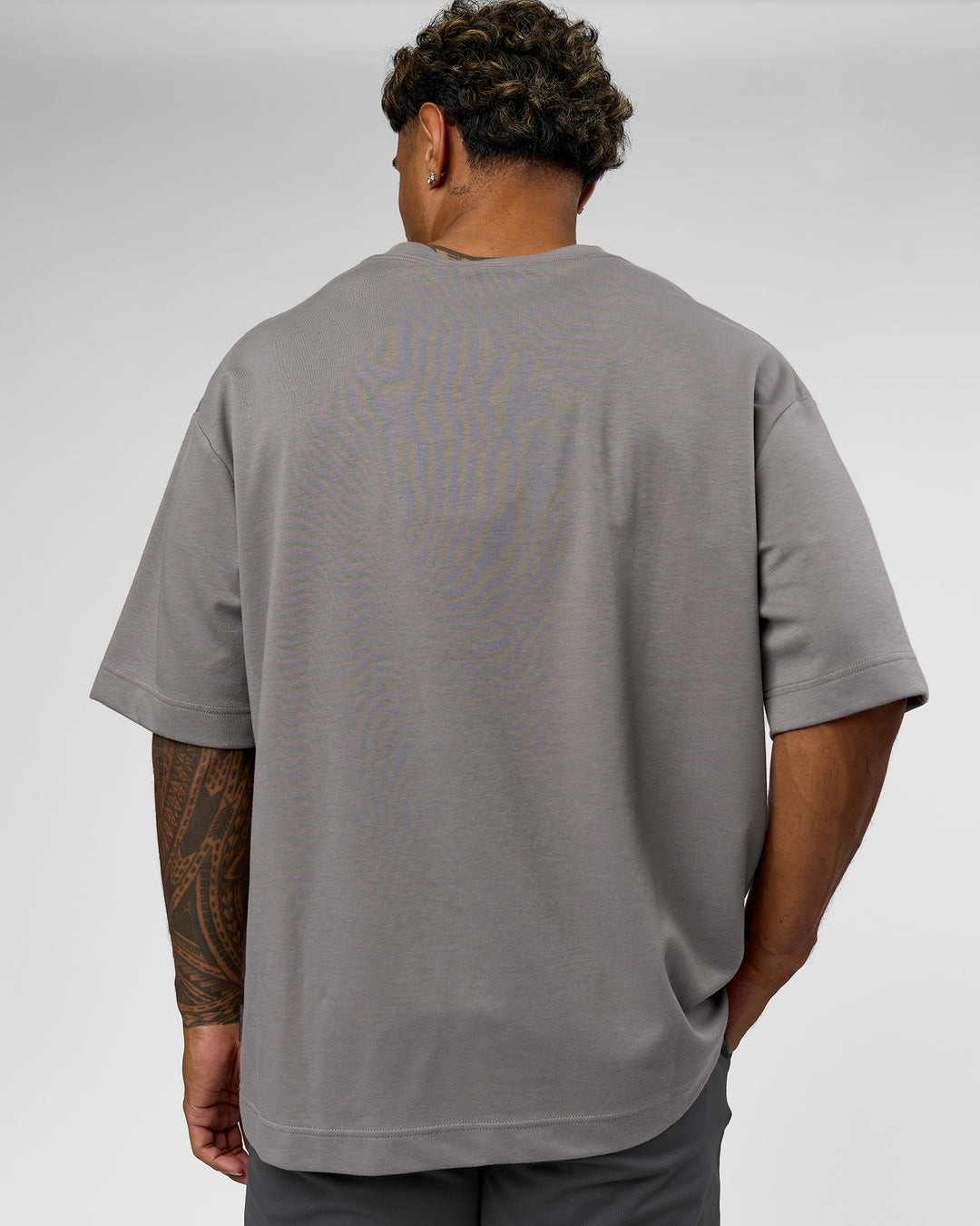 Man wearing AfterDark ZeroCrease Oversized Tee - Storm Front | Model:Xav | Size:L - view 2