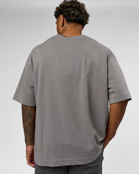 Man wearing AfterDark ZeroCrease Oversized Tee - Storm Front | Model:Xav | Size:L | Thumbnail Index: 1