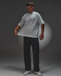 Man wearing AfterDark ZeroCrease Oversized Tee - White | Model:Jackson | Size:L | Thumbnail Index: 3