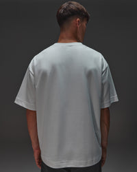 Man wearing AfterDark ZeroCrease Oversized Tee - White | Model:Jackson | Size:L | Thumbnail Index: 5