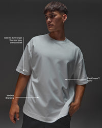 Man wearing AfterDark ZeroCrease Oversized Tee - White | Model:Mabyro | Size:M | Thumbnail Index: 2
