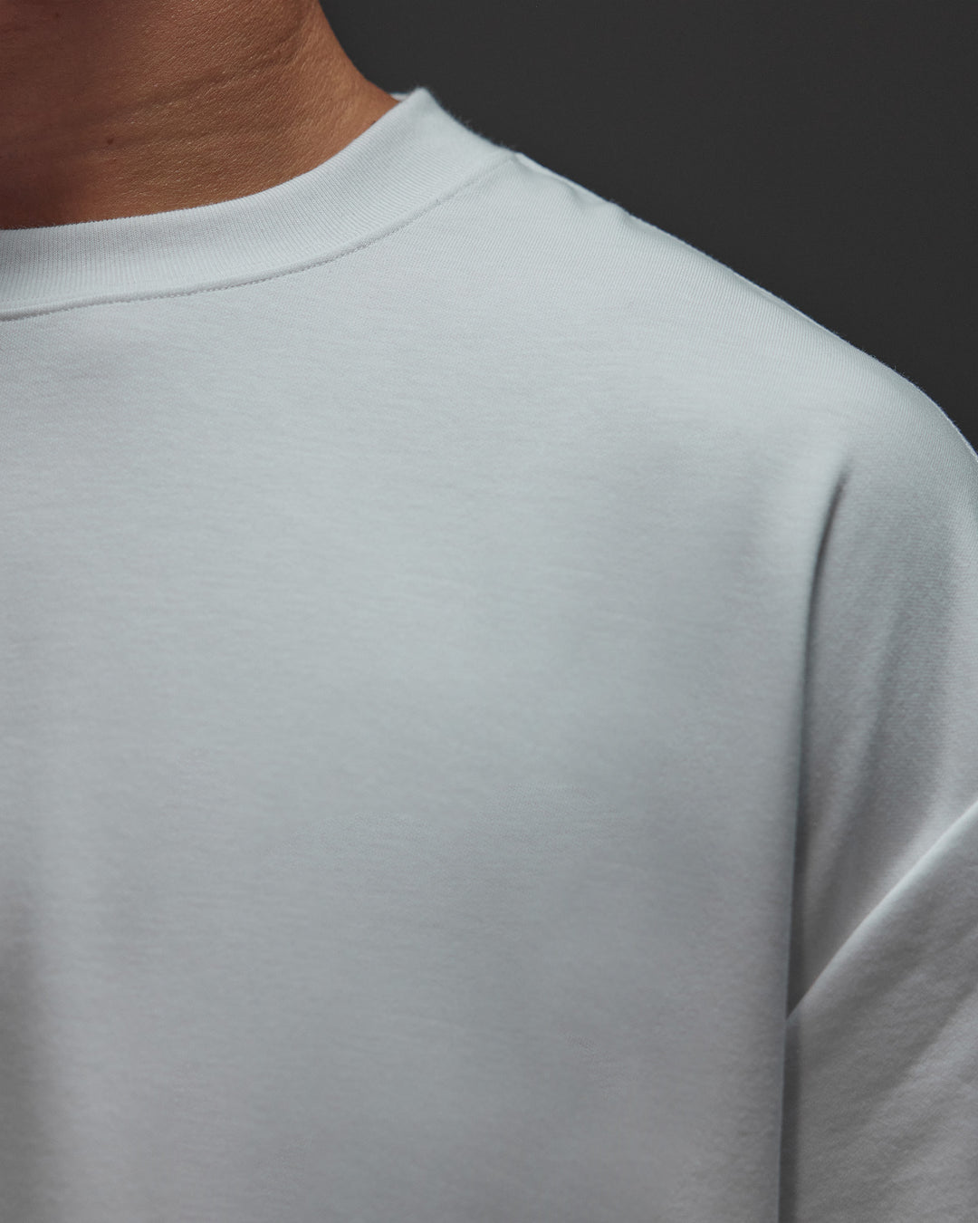 Man wearing AfterDark ZeroCrease Oversized Tee - White | Model:Jackson | Size:L - view 10