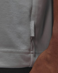 Man wearing AfterDark ZeroCrease Oversized Tee - White | Model:Jackson | Size:L | Thumbnail Index: 10
