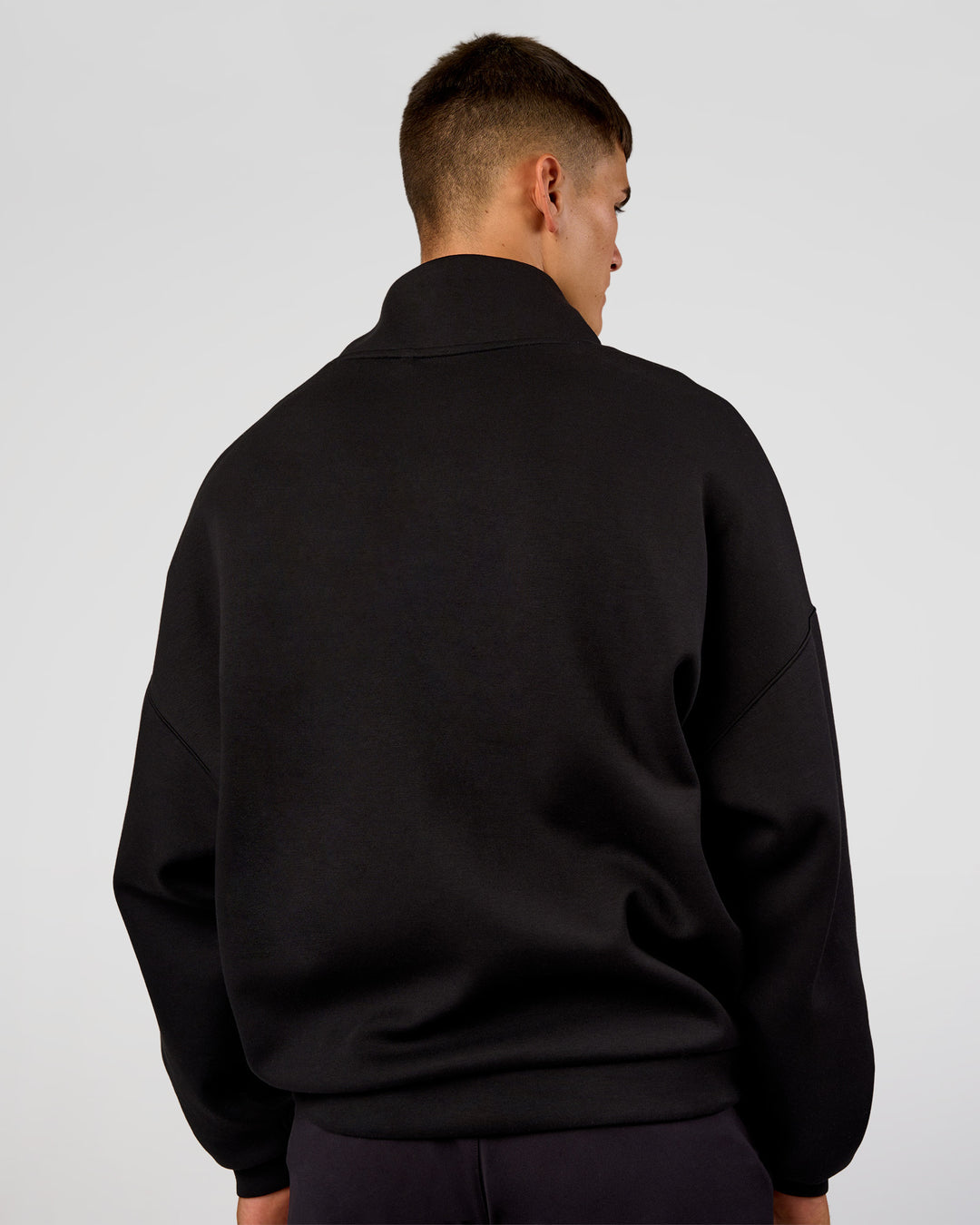 Man wearing AfterDark ZeroCrease Quarter Zip - Black | Model:Jackson | Size:L - view 6