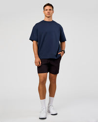 Man wearing All Day ZeroCrease™ Regular 8" Short - Black | Model:Liam | Size:34 | Thumbnail Index: 2