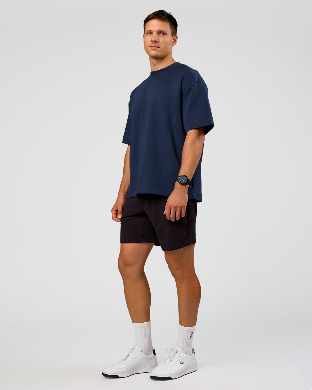 Man wearing All Day ZeroCrease™ Regular 8" Short - Black | Model:Liam | Size:34 - view 7