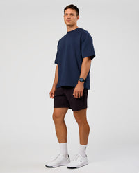 Man wearing All Day ZeroCrease™ Regular 8" Short - Black | Model:Liam | Size:34 | Thumbnail Index: 6