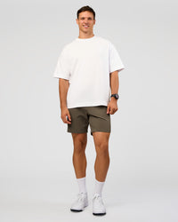 Man wearing All Day ZeroCrease™ Regular 8" Short - Walnut Grey | Model:Liam | Size:34 | Thumbnail Index: 4
