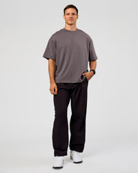 Man wearing All Day ZeroCrease™ Wide Leg Pant - Black | Model:Liam | Size:34 | Thumbnail Index: 6
