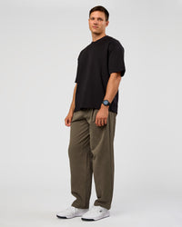 Man wearing All Day ZeroCrease™ Wide Leg Pant - Walnut Grey | Model:Liam | Size:L | Thumbnail Index: 4