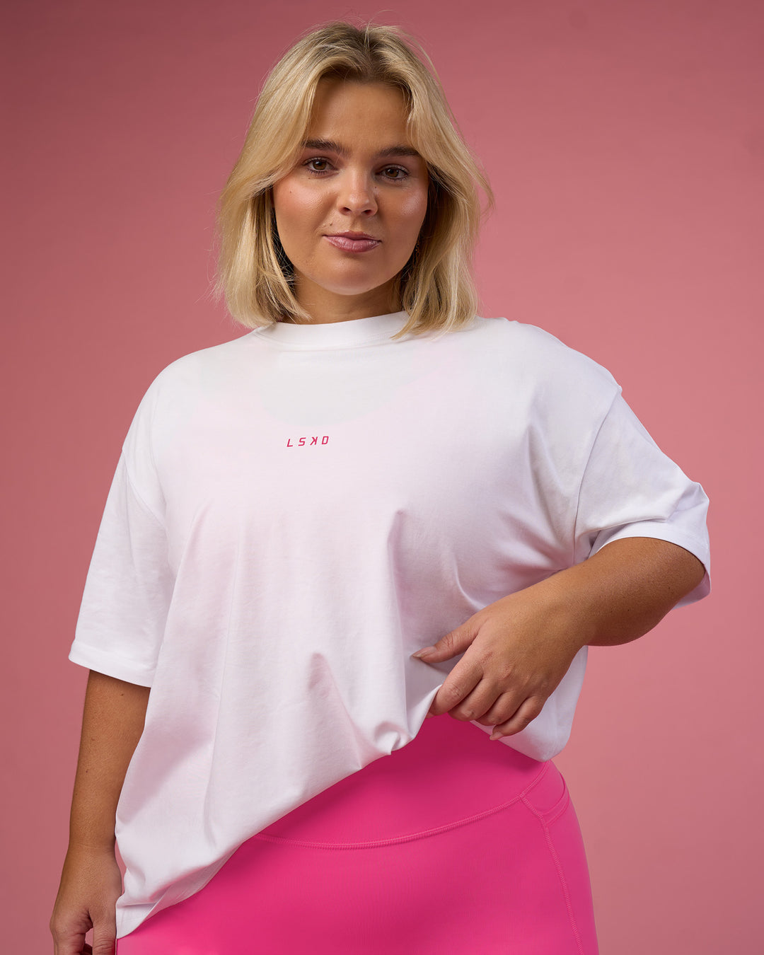 Woman wearing BCAM Go-To FLXCotton Oversized Tee - White-Ultra Pink | Model:Bianca | Size:L - view 3