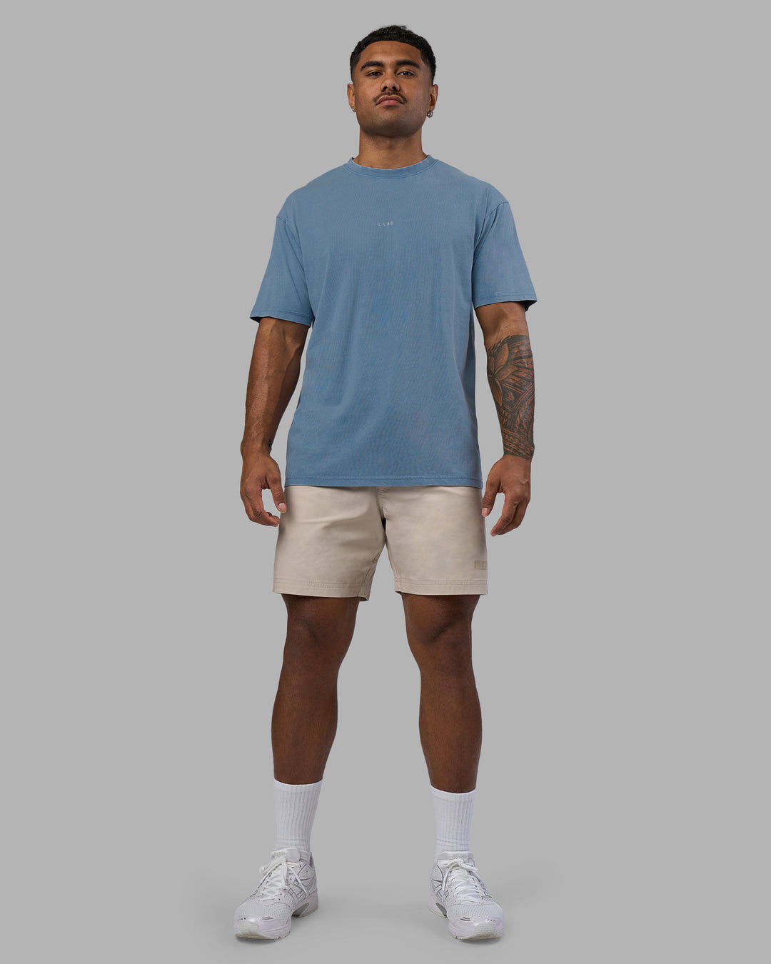 Man wearing Base FLXCotton Tee Oversized - Elemental Blue Washed | Model:Xav | Size:L - view 4