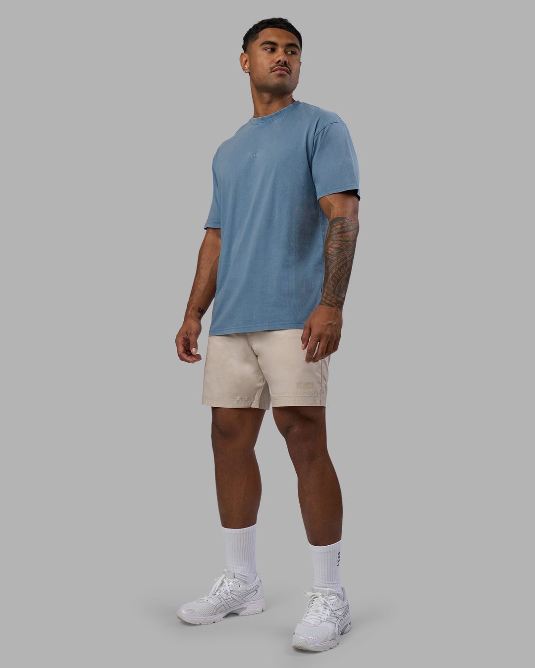 Man wearing Base FLXCotton Tee Oversized - Elemental Blue Washed | Model:Xav | Size:L - view 2