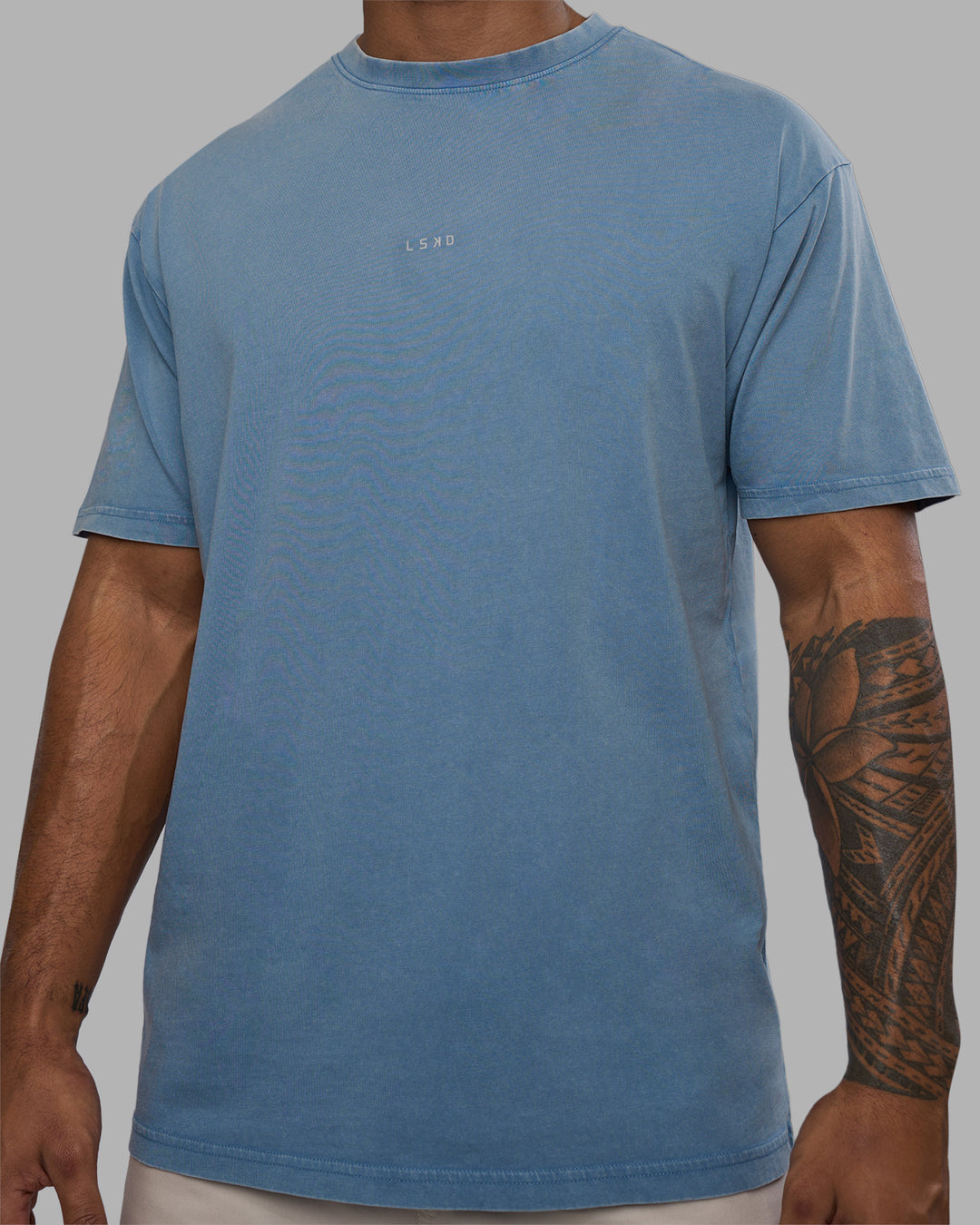Man wearing Base FLXCotton Tee Oversized - Elemental Blue Washed | Model:Xav | Size:L - view 5