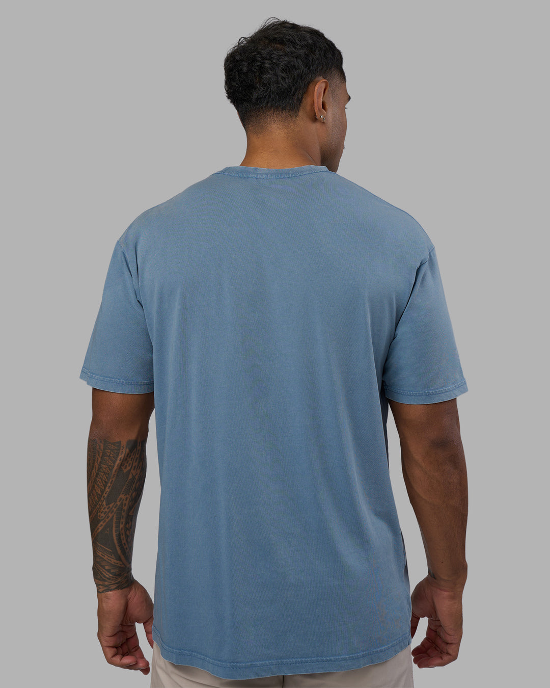 Man wearing Base FLXCotton Tee Oversized - Elemental Blue Washed | Model:Xav | Size:L - view 3