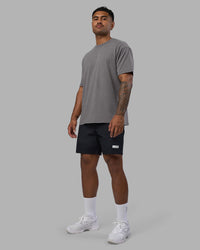 Man wearing Base FLXCotton Tee Oversized - Storm Front Washed | Model:Xav | Size:L | Thumbnail Index: 1