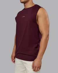 Man wearing Base FLXCotton Tank - Cherry Lacquer | Model:Kaelyb | Size:L | Thumbnail Index: 3