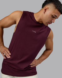 Man wearing Base FLXCotton Tank - Cherry Lacquer | Model:Kaelyb | Size:L | Thumbnail Index: 5