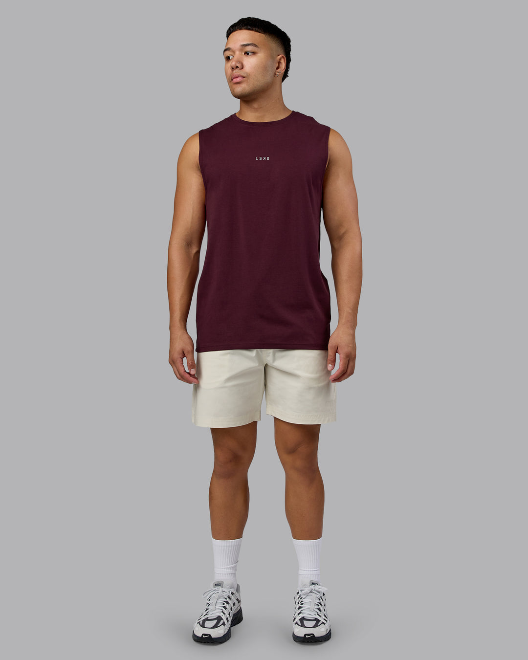 Man wearing Base FLXCotton Tank - Cherry Lacquer | Model:Kaelyb | Size:L - view 5