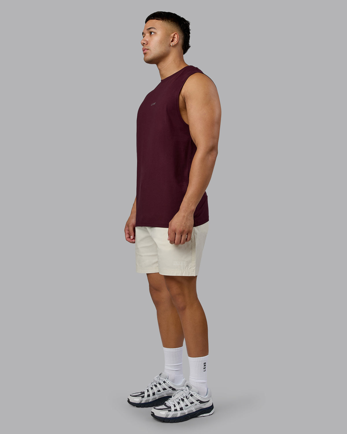 Man wearing Base FLXCotton Tank - Cherry Lacquer | Model:Kaelyb | Size:L