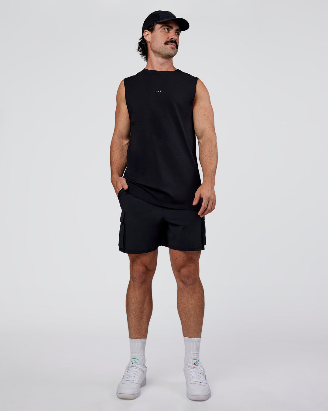 Man wearing Base FLXCotton Tank Regular Fit +2cm - Black | Model:Adam | Size:L - view 4