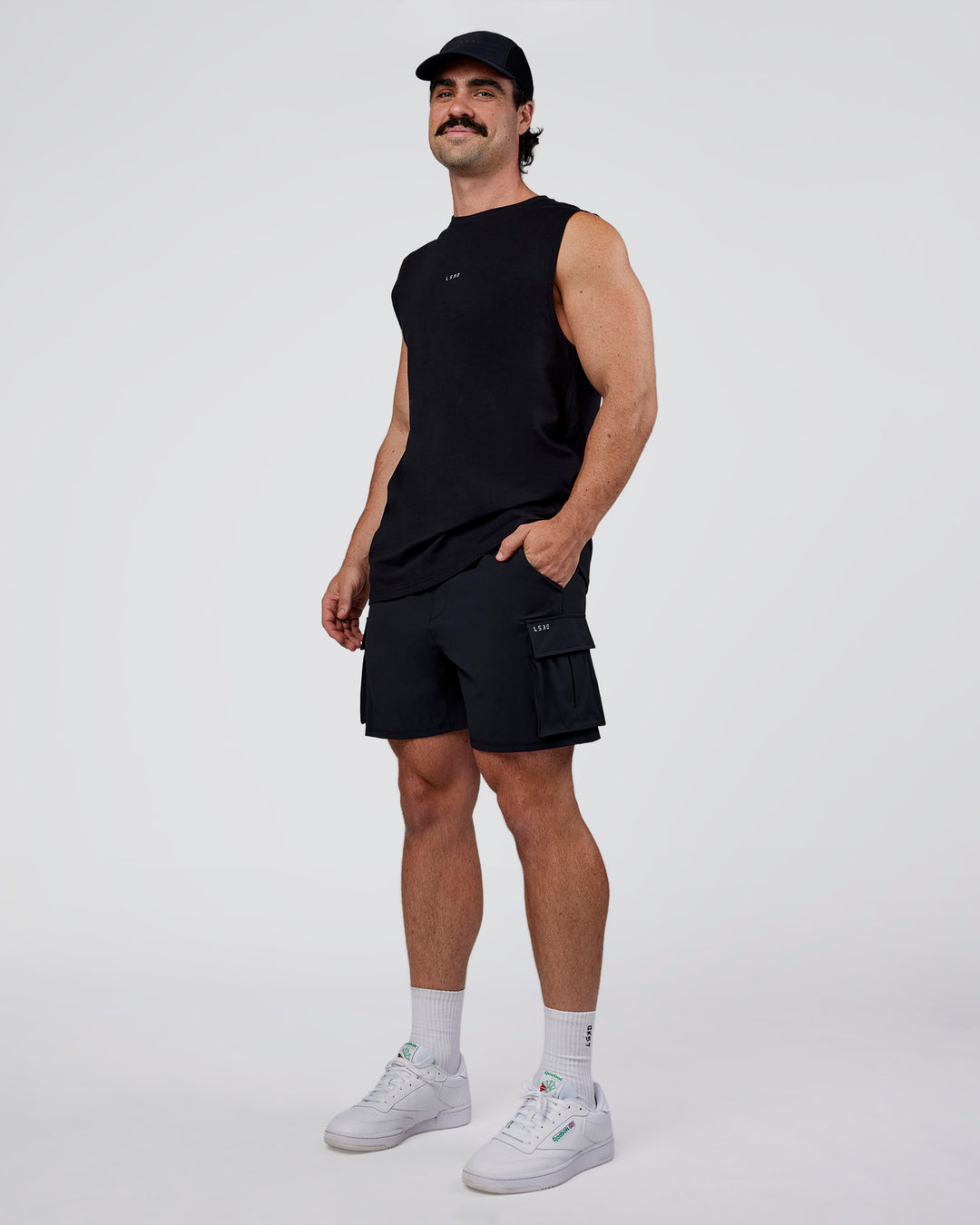 Man wearing Base FLXCotton Tank Regular Fit +2cm - Black | Model:Adam | Size:L - view 2