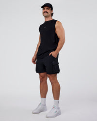 Man wearing Base FLXCotton Tank Regular Fit +2cm - Black | Model:Adam | Size:L | Thumbnail Index: 1
