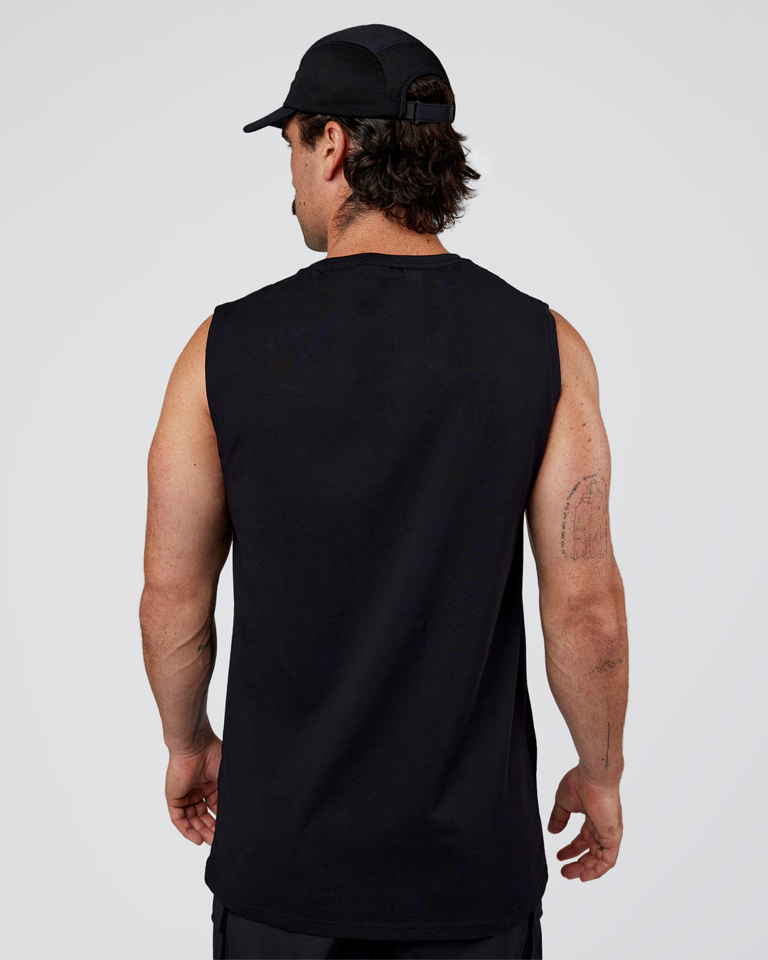 Man wearing Base FLXCotton Tank Regular Fit +2cm - Black | Model:Adam | Size:L - view 3