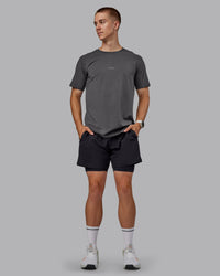 Man wearing Base FLXCotton Tee - Dark Storm | Thumbnail Index: 2