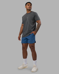 Man wearing Base FLXCotton Tee - Dark Storm Washed| Model:Xav | Size:L | Thumbnail Index: 0