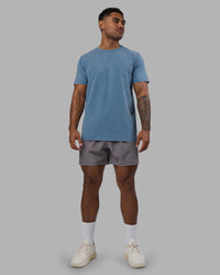 Man wearing Base FLXCotton Tee - Elemental Blue Washed | Model:Xav | Size:L | Thumbnail Index: 2