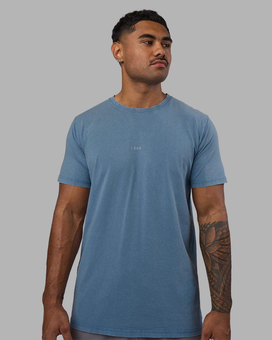 Man wearing Base FLXCotton Tee - Elemental Blue Washed | Model:Xav | Size:L - view 1