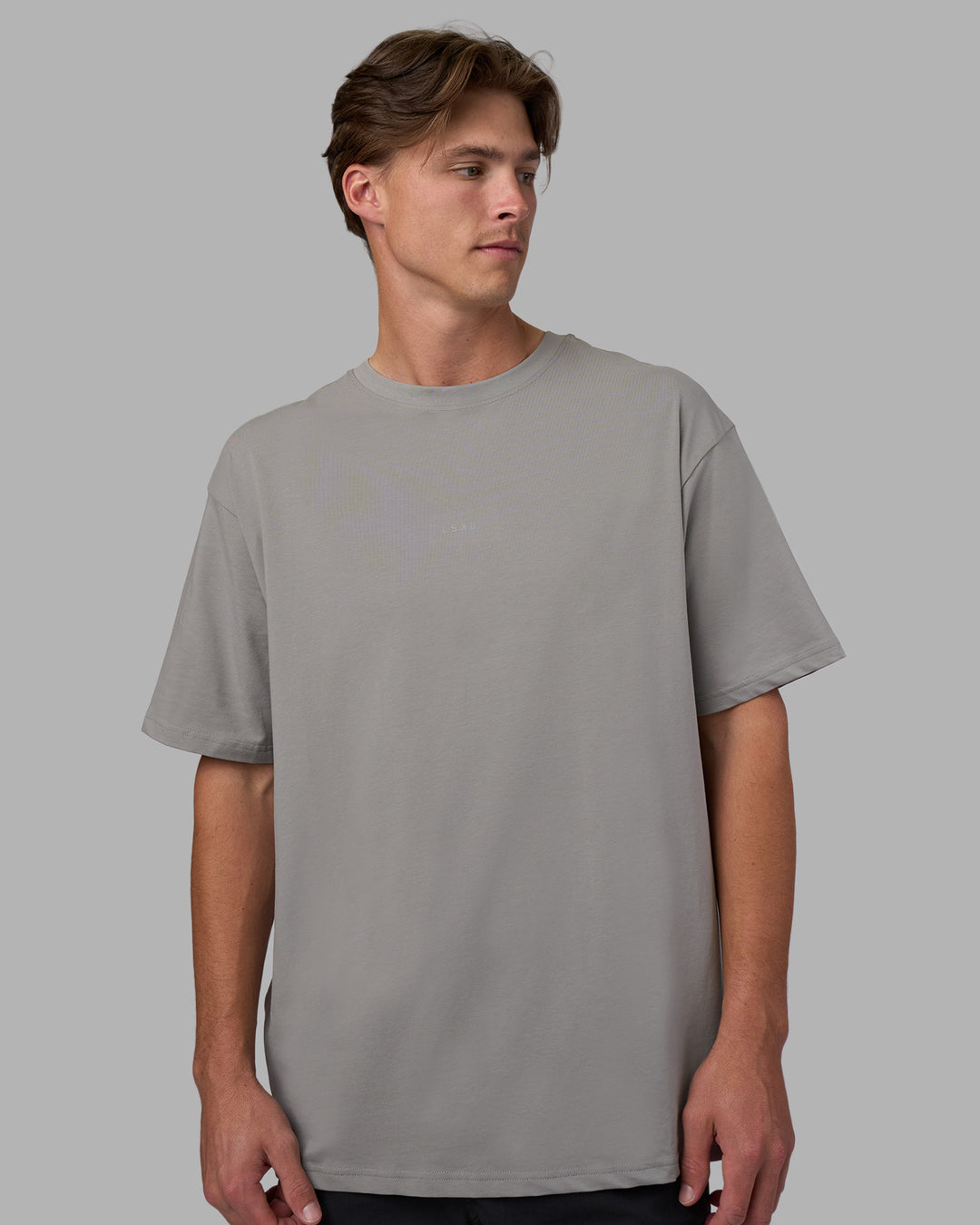 Man wearing Base FLXCotton Tee Oversized - Circular-Grey  Model:Brandon | Size:L - view 4