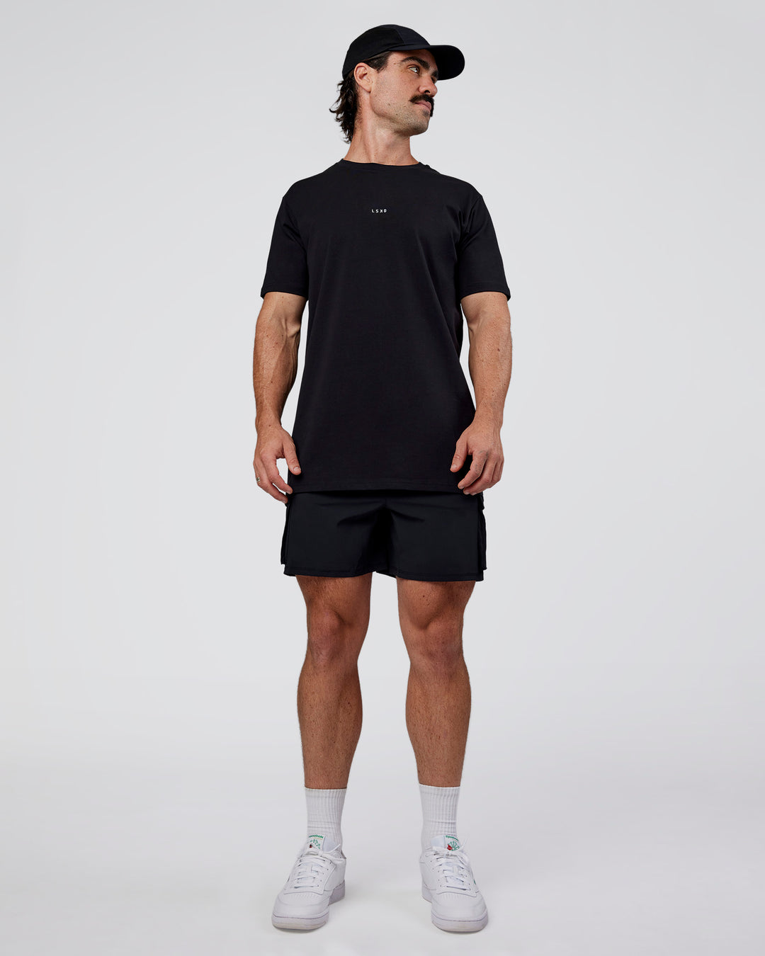 Man wearing Base FLXCotton Tee  Regular Fit +2cm - Black | Model:Adam | Size:L - view 5