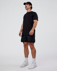 Man wearing Base FLXCotton Tee  Regular Fit +2cm - Black | Model:Adam | Size:L | Thumbnail Index: 1