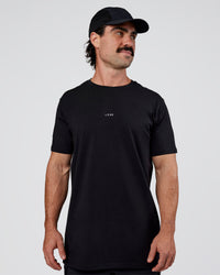 Man wearing Base FLXCotton Tee  Regular Fit +2cm - Black | Model:Adam | Size:L | Thumbnail Index: 0