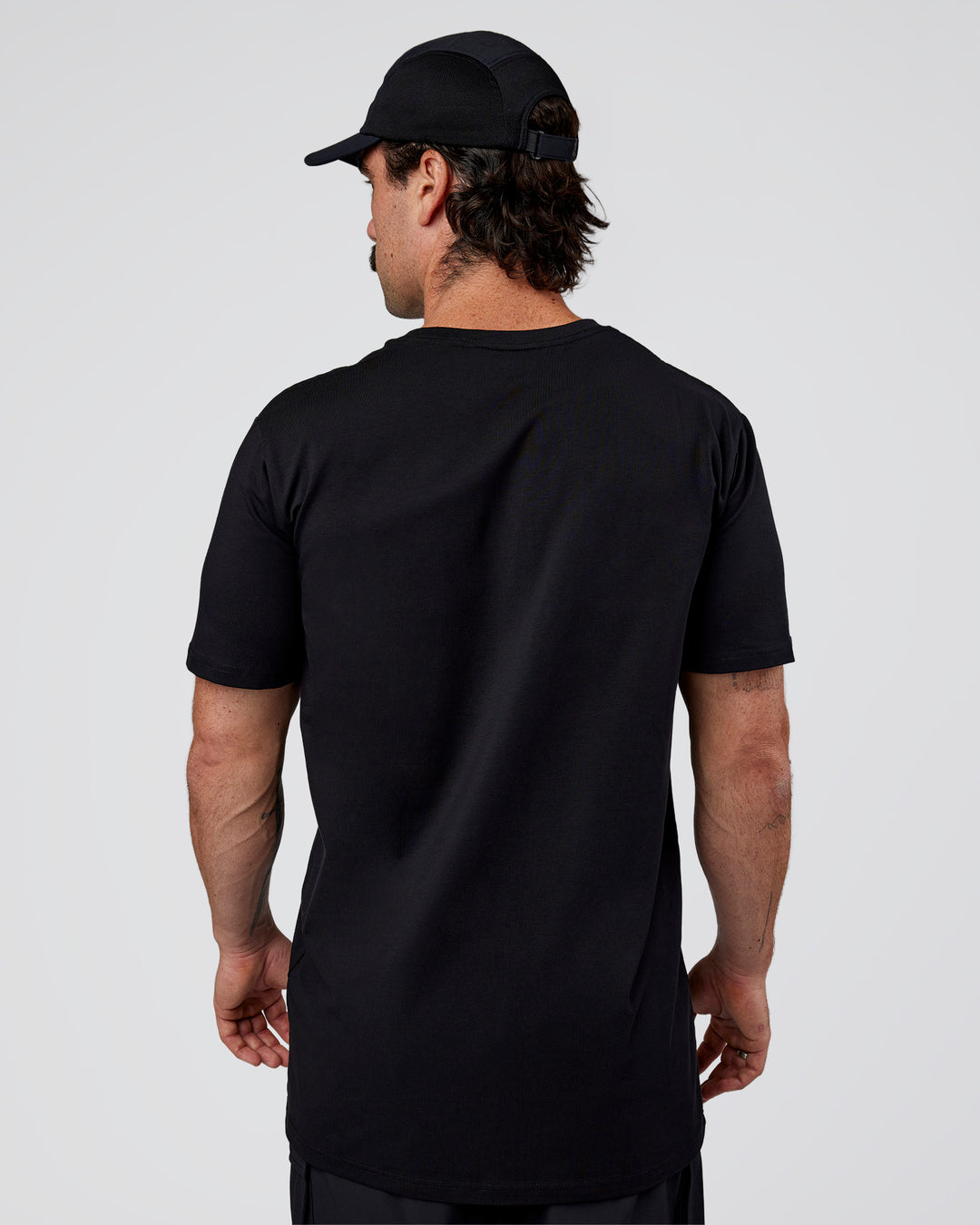 Man wearing Base FLXCotton Tee  Regular Fit +2cm - Black | Model:Adam | Size:L - view 4