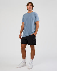 Man wearing Base FLXCotton Tee  Regular Fit +2cm - Elemental Blue Washed | Model:Marcus | Size:L | Thumbnail Index: 1