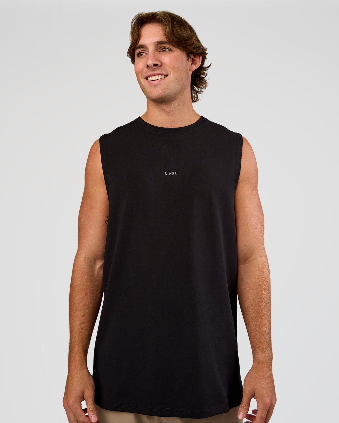 Man wearing Base Heavyweight FLXCotton Tank Regular Fit +2cm - Black | Model:Marcus | Size:L - view 1