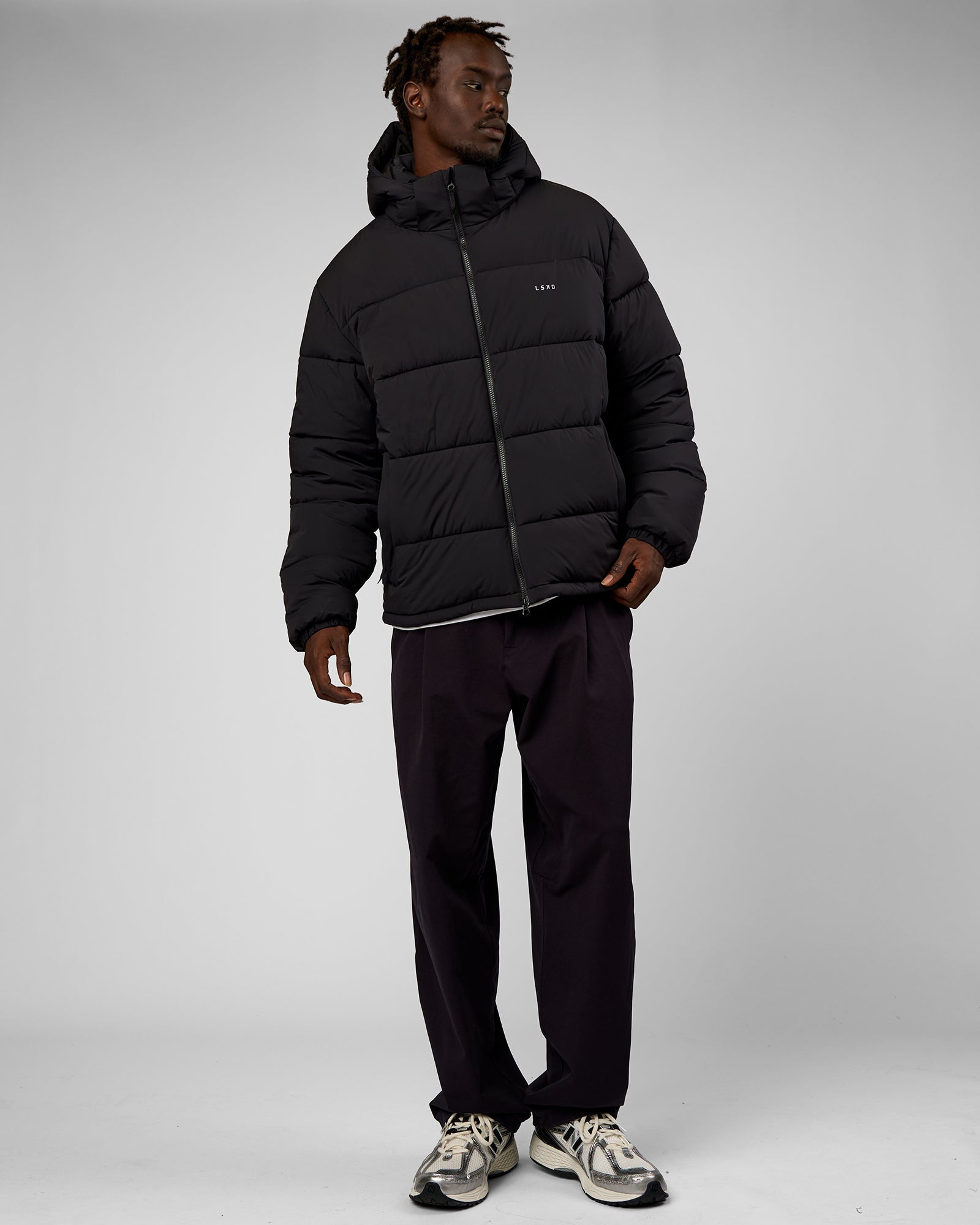 Man wearing Base Puffer Jacket - Black | Model:Okello | Size:L