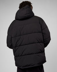 Man wearing Base Puffer Jacket - Black | Model:Okello | Size:L | Thumbnail Index: 2