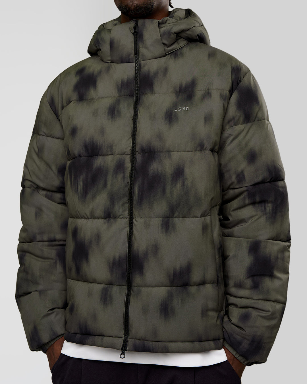 Man wearing Base Puffer Jacket - Camo Washed Walnut Grey | Model:Okello | Size:L - view 7