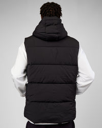 Man wearing Base Puffer Vest - Black | Model:Okello | Size:L | Thumbnail Index: 3