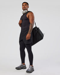 Man wearing BaseTech 26" Leggings - Black | Model:Xav | Size:L | Thumbnail Index: 4