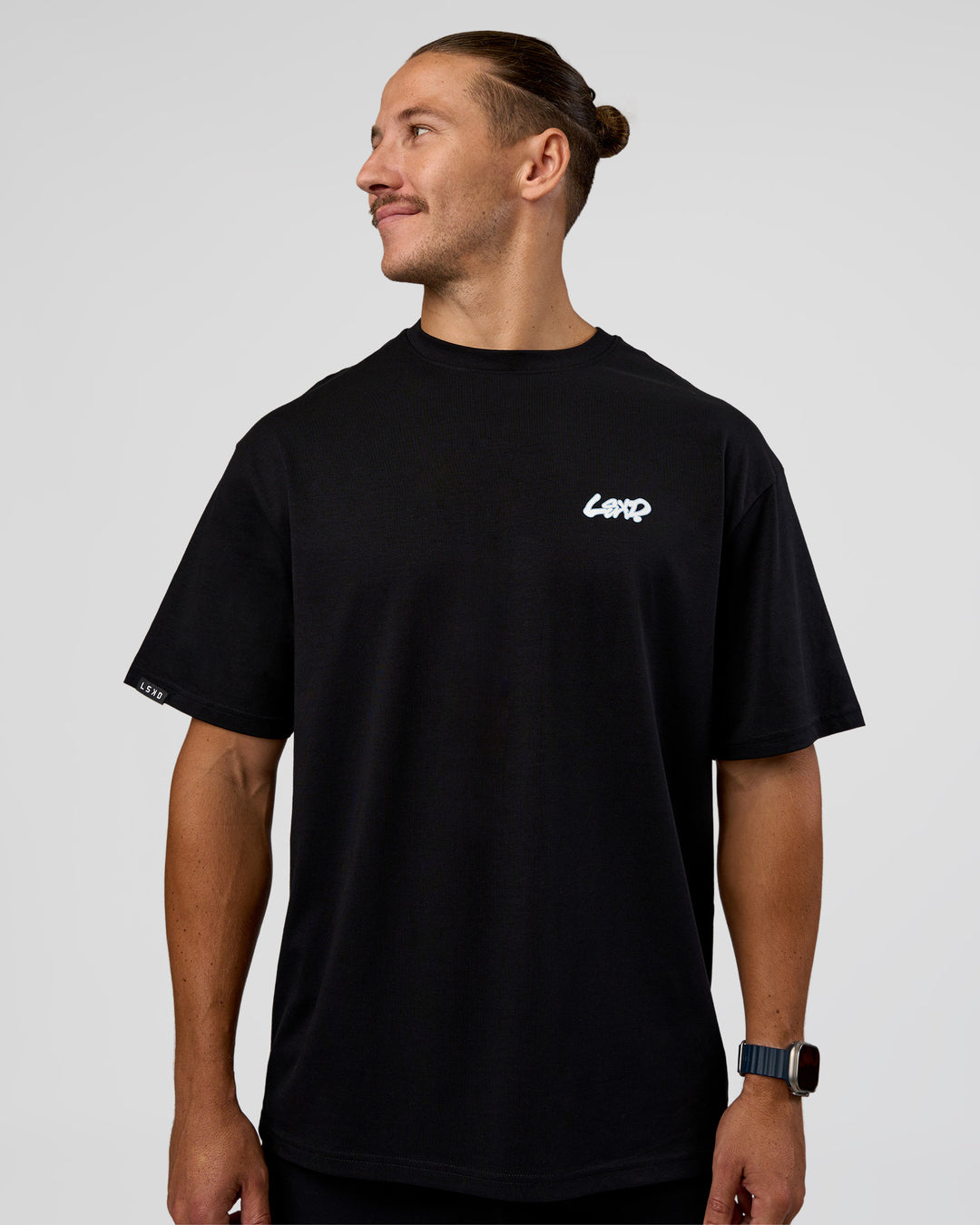 Man wearing Break Through FLXCotton Oversized Tee - Black-Open Air | Model:Jaiden | Size:L - view 5