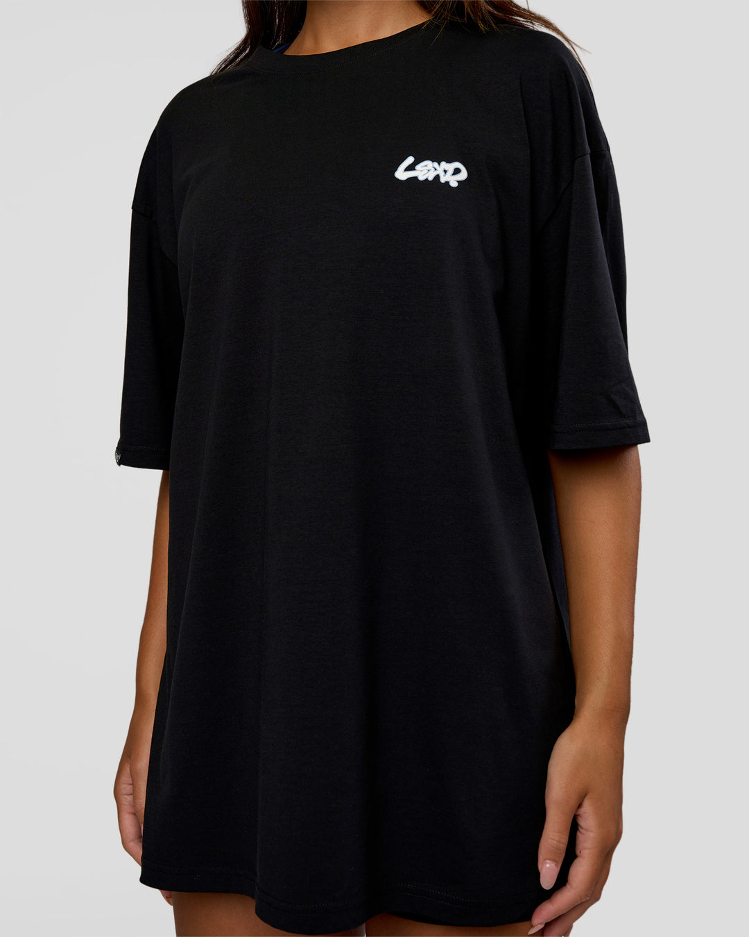 Woman wearing Break Through FLXCotton Oversized Tee - Black-Open Air | Model:Kirstyn | Size:L - view 8